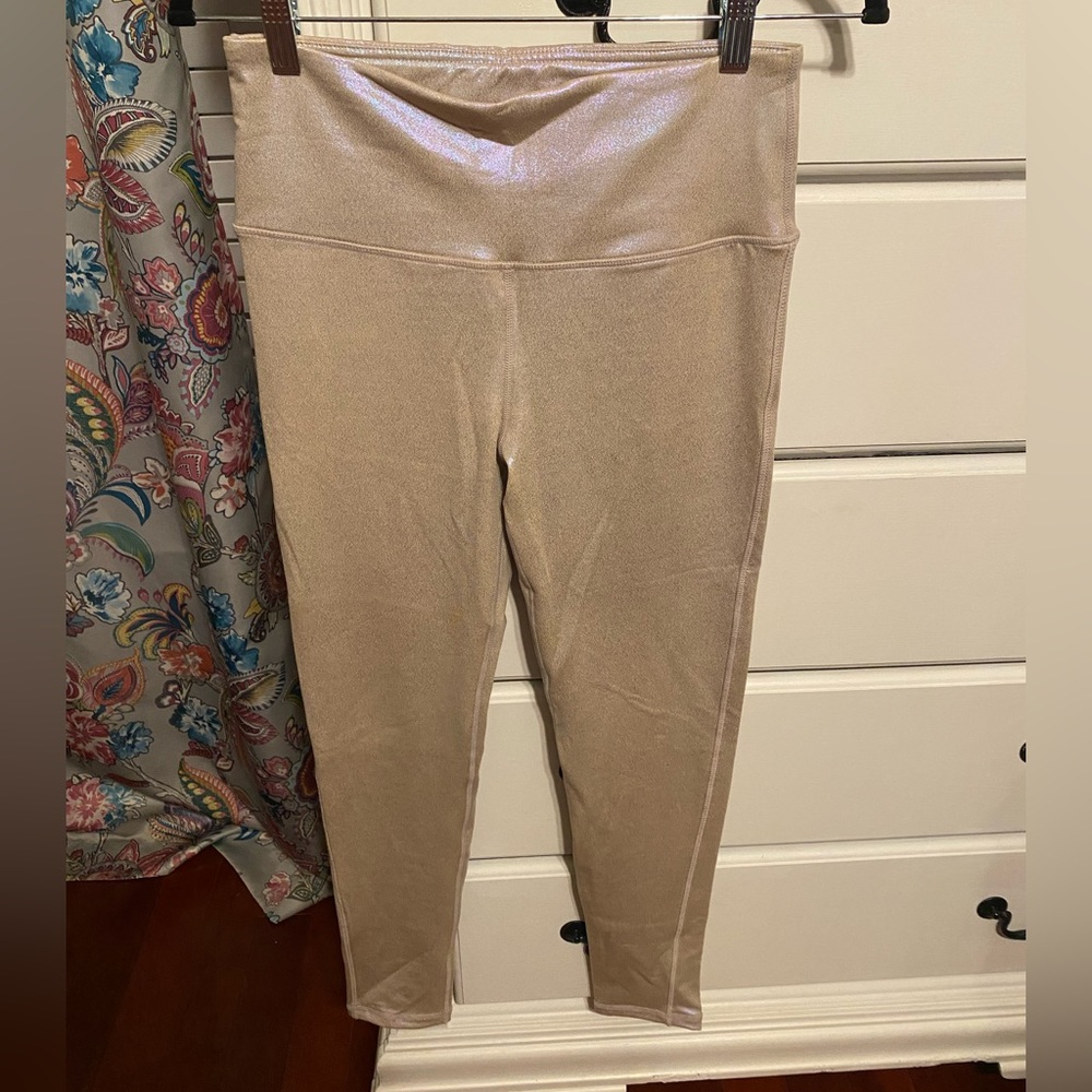 Nude/ pale pinkish full length leggings . Worn once. Size Medium.